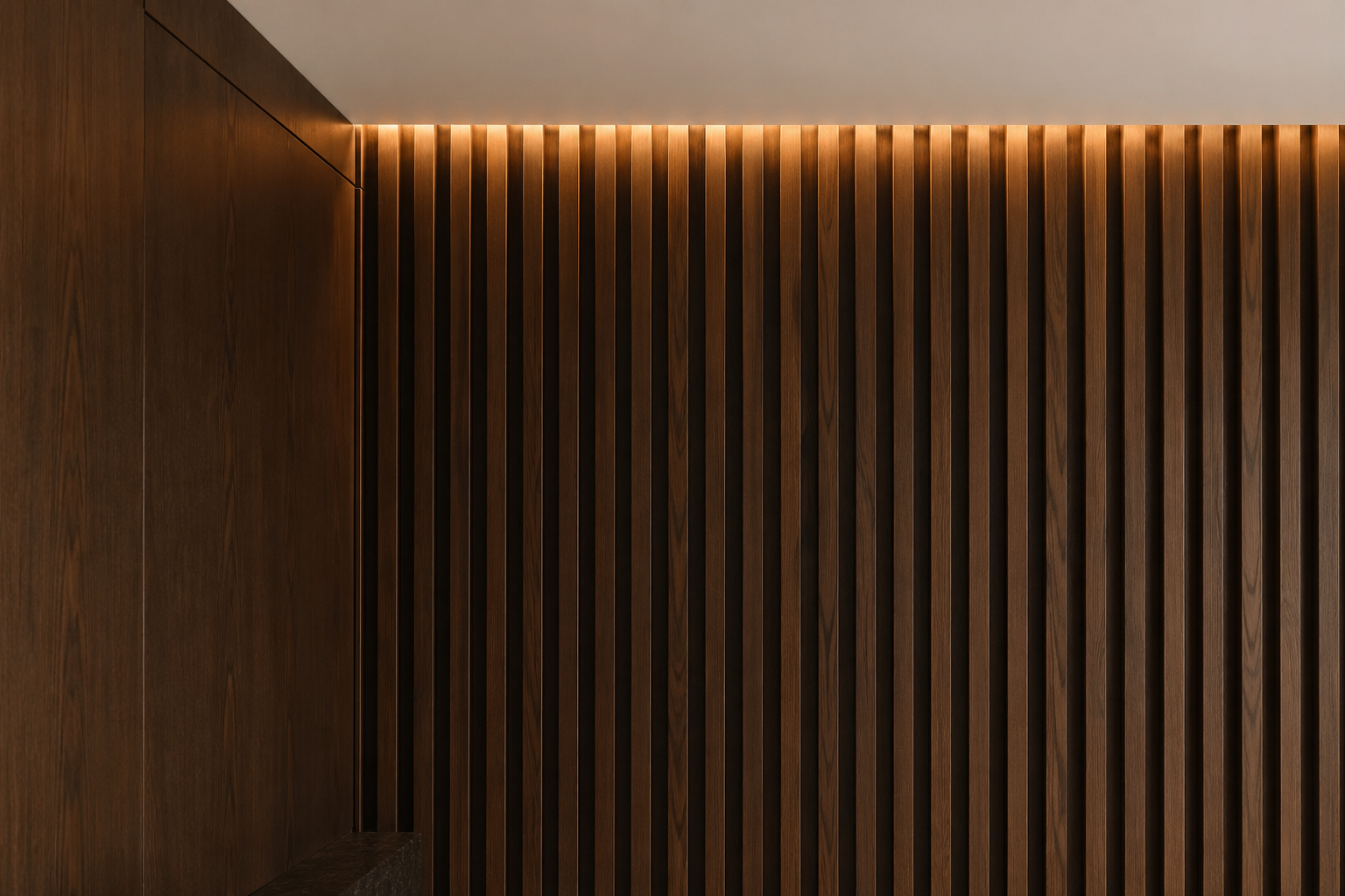 Bespoke interior wall with vertical walnut wood slats and accent lighting